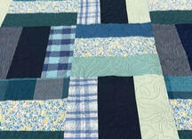 Memory quilt made out of deceased dress shirts